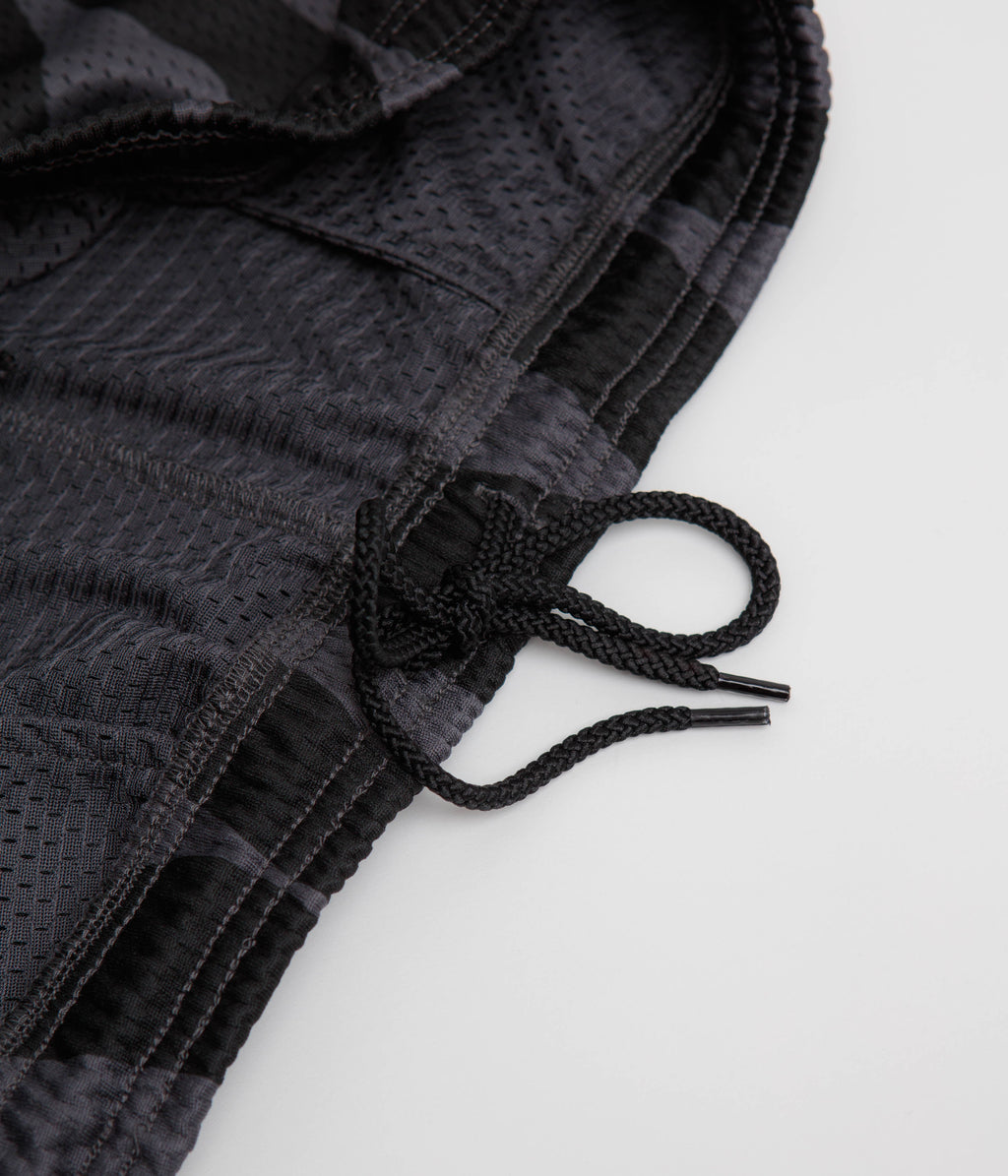 by Parra Waved Mesh Shorts - Black
