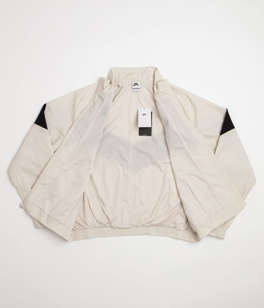 Nike SB Pavan Track Jacket - Light Orewood Brown / Black / Black / White