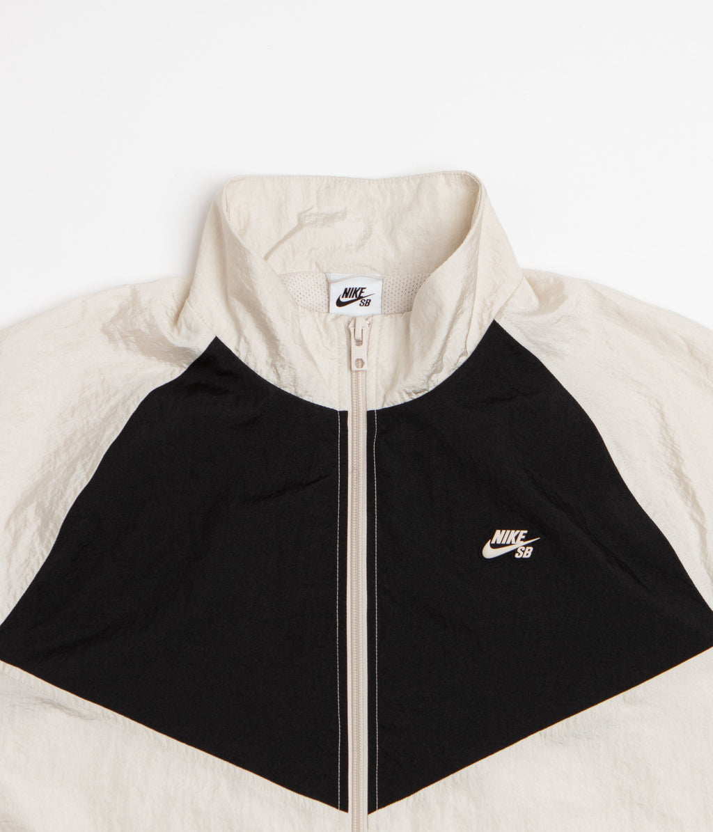 Nike SB Pavan Track Jacket - Light Orewood Brown / Black / Black / White